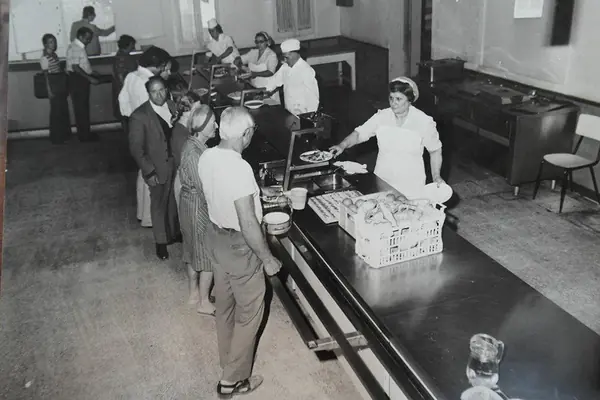 Latina refugee camp mess hall - daily life of refugees in 1970s Italy